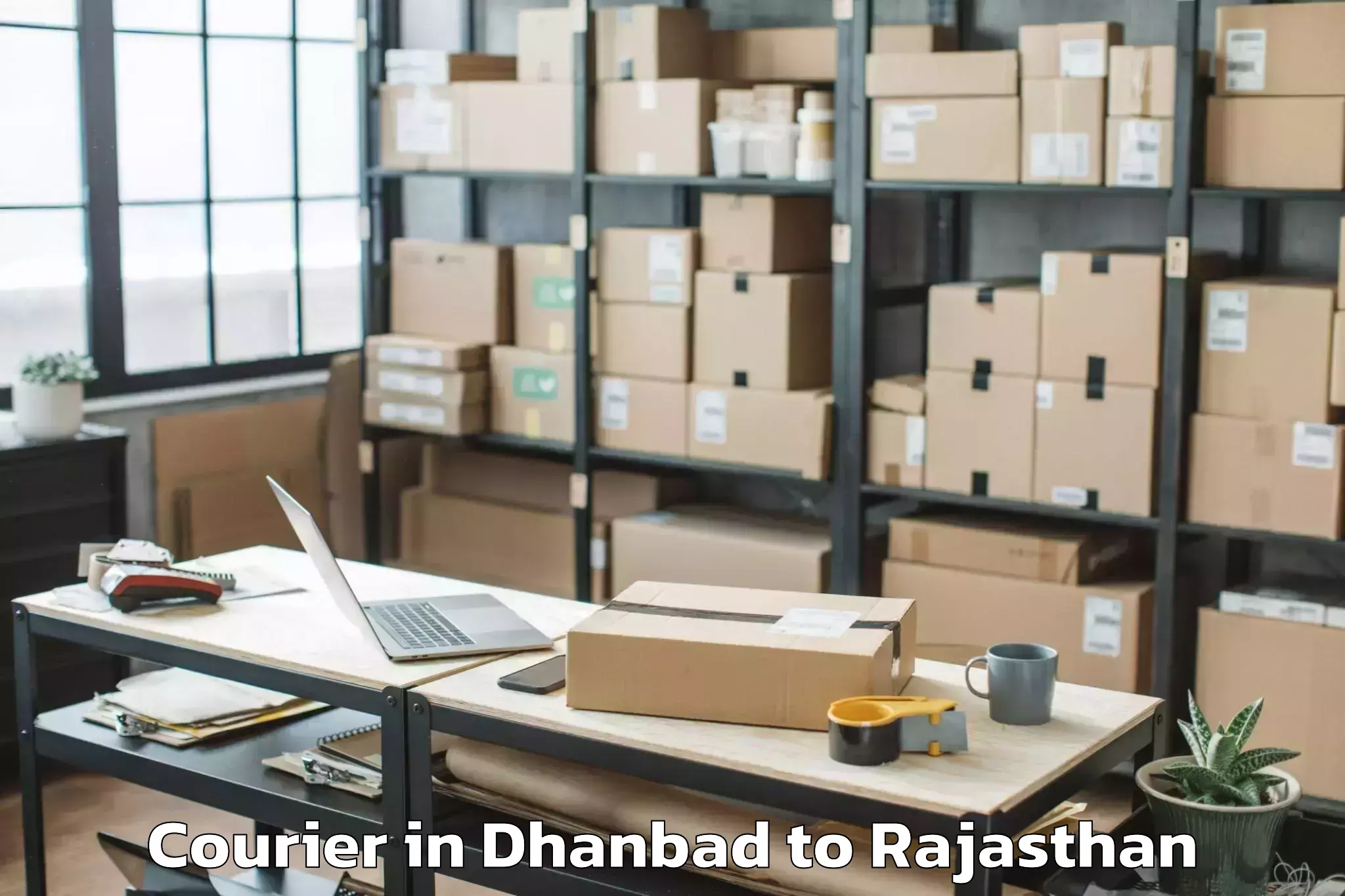 Hassle-Free Dhanbad to Sangaria Courier